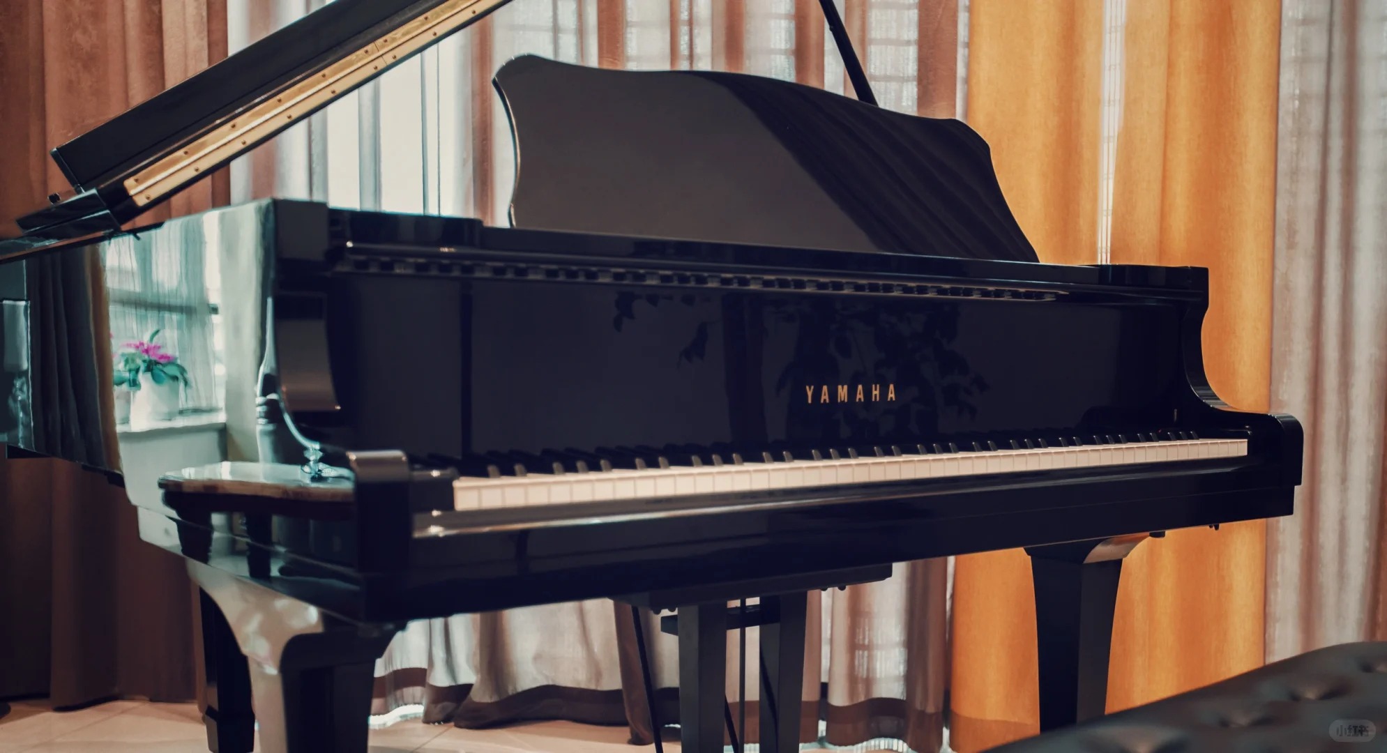 Concert-grade grand piano in a refined concert setting