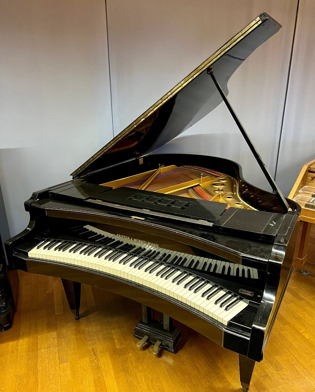 Piano à queue ancien Zeitter & Winkelmann – patrimoine d'un instrument de valeur