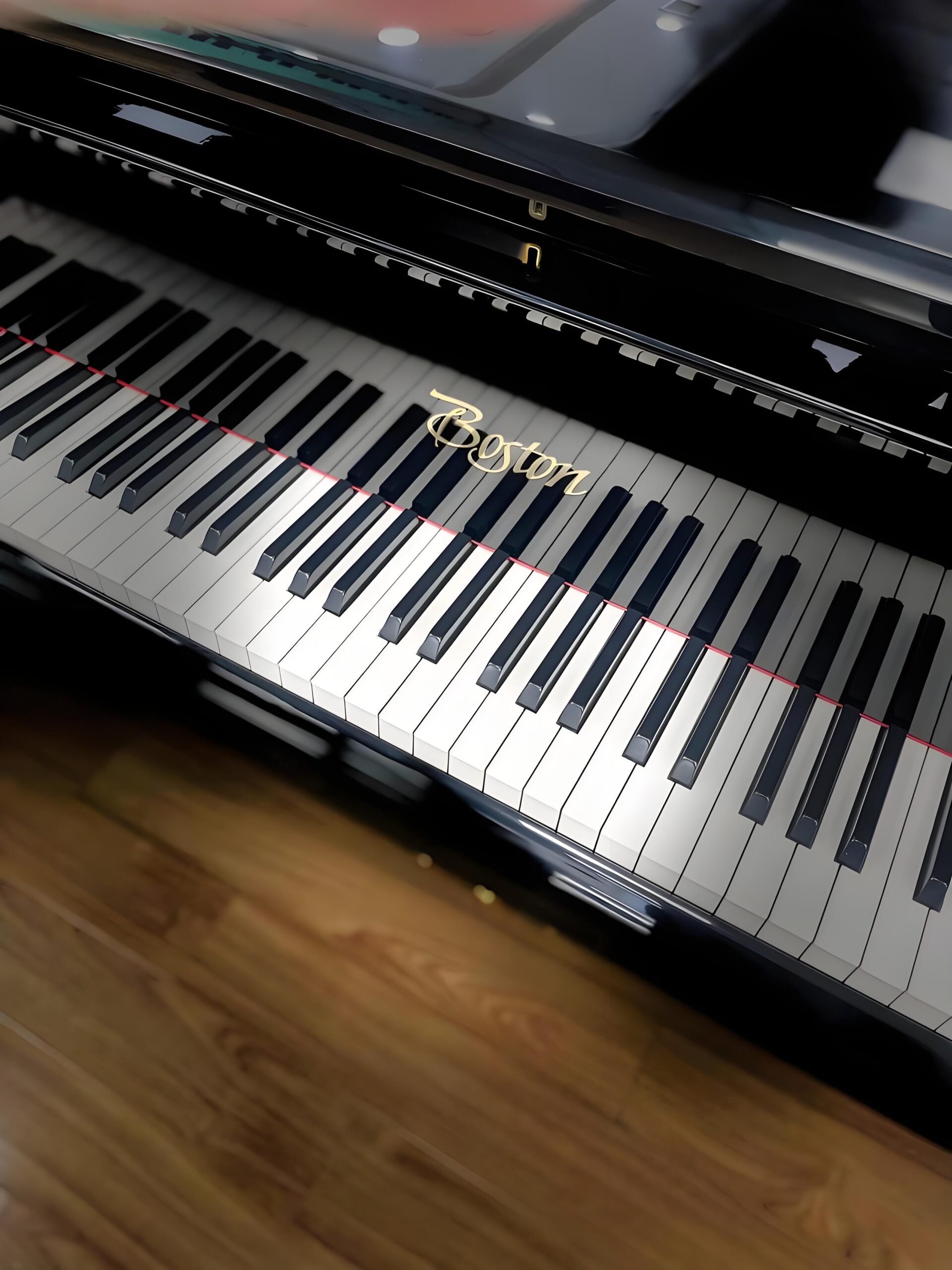 Clavier et logo doré Boston – détail du GP-193